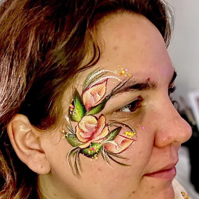 Peach rose and buds with green leaves and gold glitter