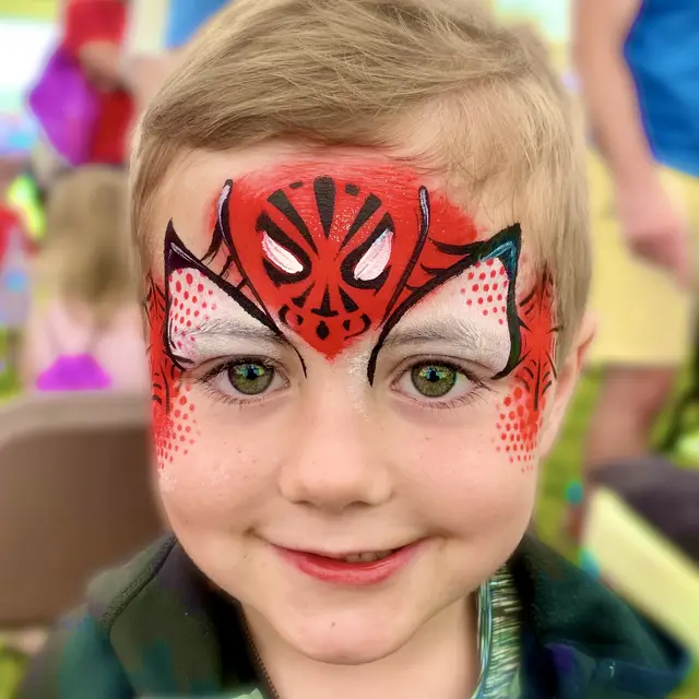 Red superhero mask with black web detail