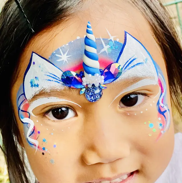 Face gems — portfolio example by Mika Face Painting