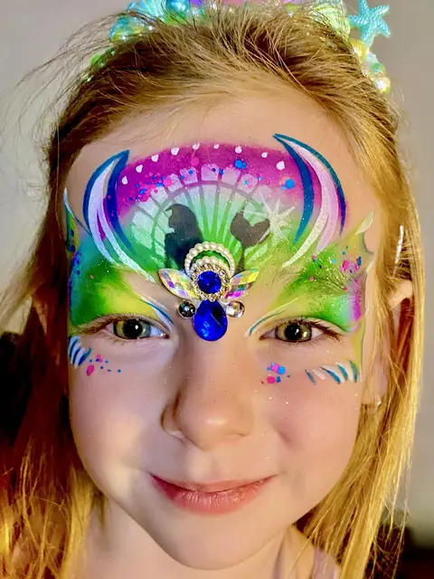 Face gems — portfolio example by Mika Face Painting