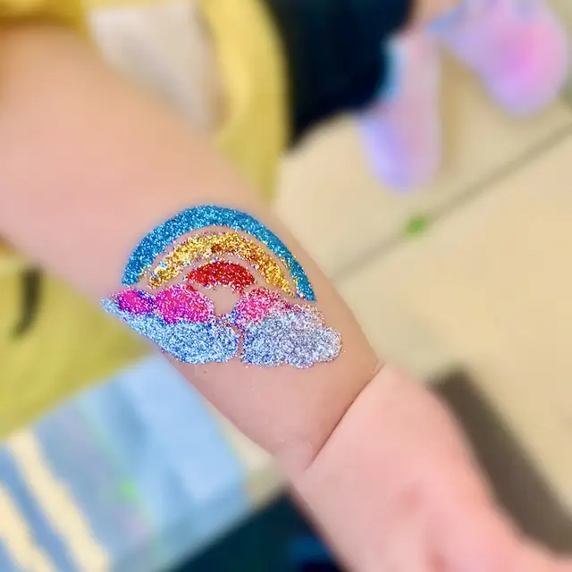 Glitter tattoos — portfolio example by Mika Face Painting