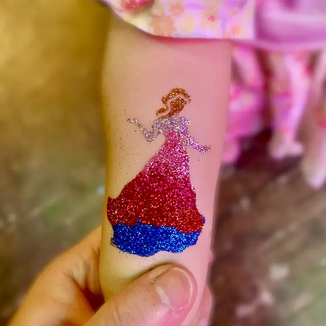 Glitter tattoos — portfolio example by Mika Face Painting