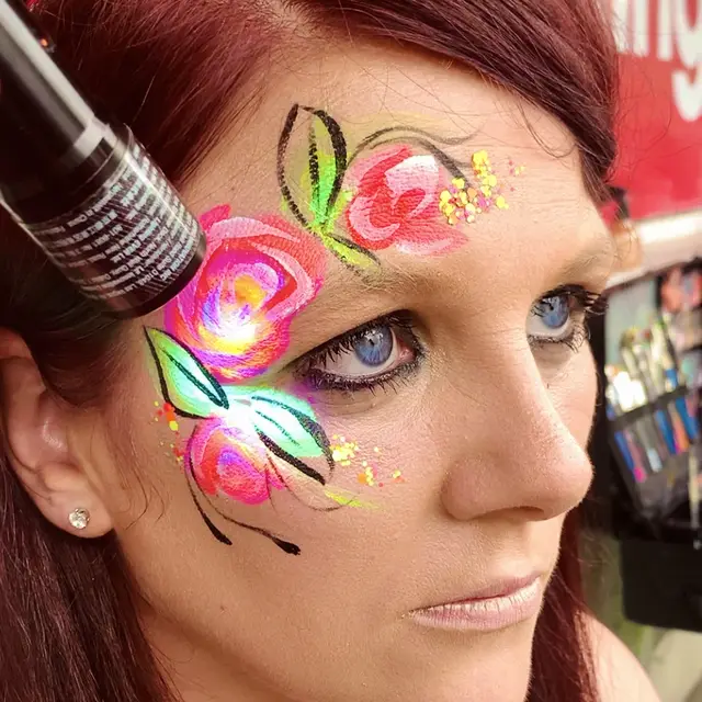 Pink and yellow roses across the forehead